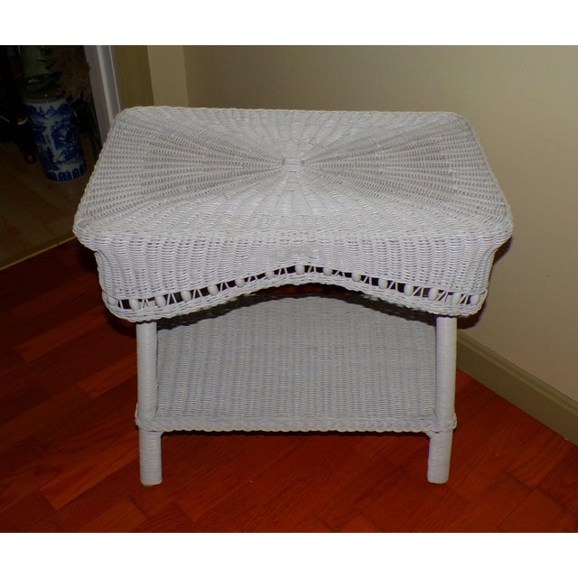 Vintage White Draped Wicker Rattan Sculpted Beaded Coffee Table Plant Stand features a woven wicker top, decorative...