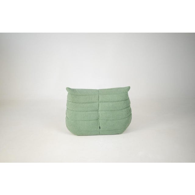This Togo has been reupholstered with new foam and high-quality new fabric, keeping its inner structure, giving the item...