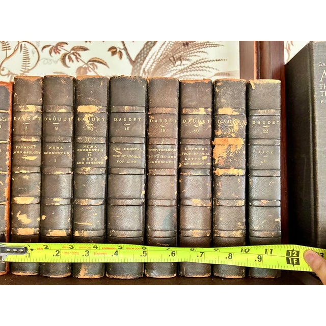 Decorative Books black leather book bundle. 8 books totalling 1 foot. Beautiful marbled front and backs with marbled...