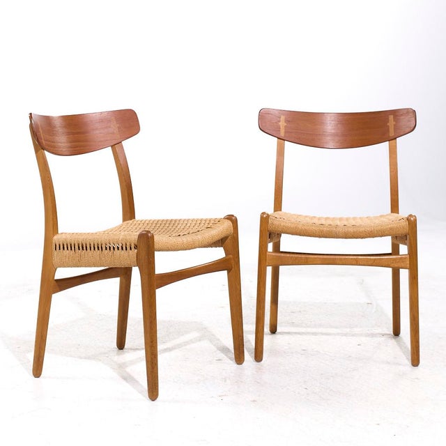 Hans Wegner for Carl Hansen & Son CH23 Mid Century Danish Teak and Oak Dining Chairs - Pair Each chair measures: 20.5 wide...