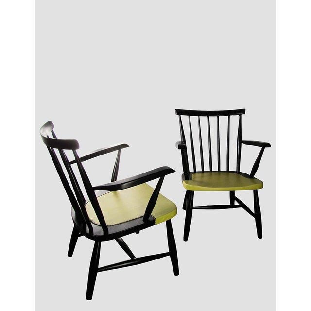 - Set of 2 spindle back armchairs, 1950s-1960s - In the style of Ilmari Tapiovaara and Yngve Ekstrom - The chairs are made...