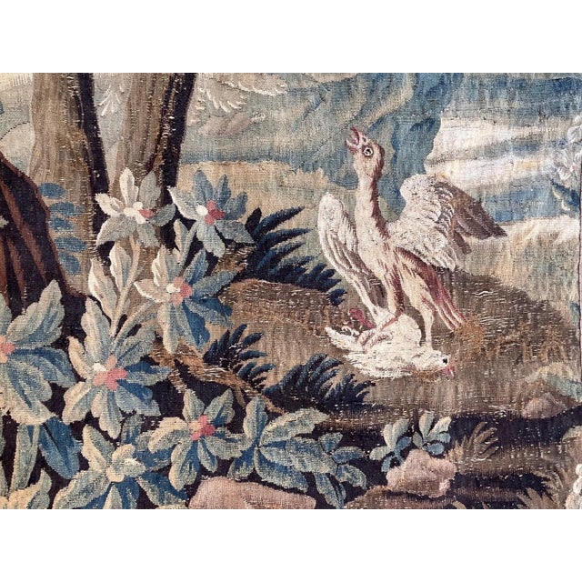 Beautiful antique verdure tapestry measuring approximately 42 x 59 inches. The tapestry depicts a striking naturalistic...