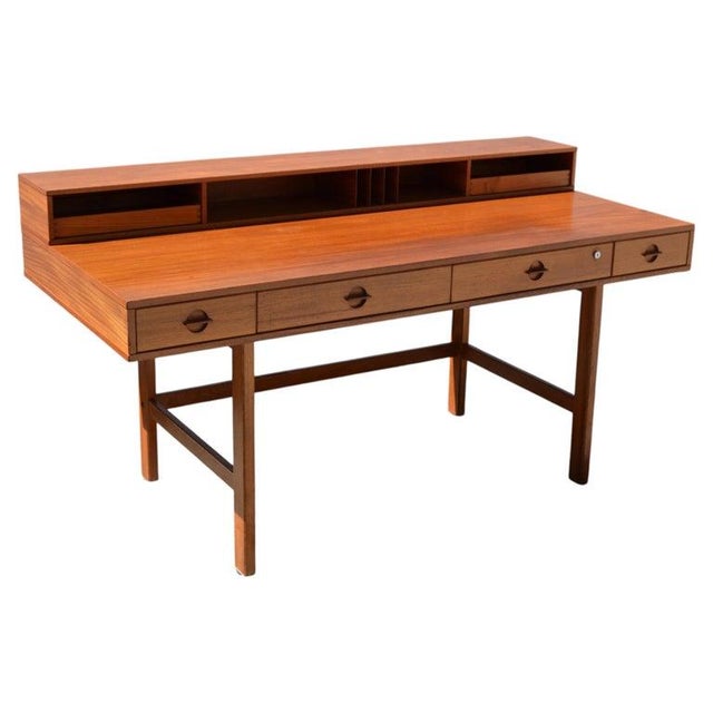 Danish Modern Teak flip-top desk by Peter Løvig Nielsen, featuring a sleek wooden frame, 4 dovetailed Writing Desk...
