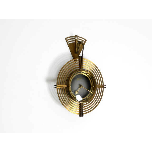 Beautiful, original, unique, round Mid-Century Modern Atlanta wall clock. Made in Germany. Very beautiful, elaborate Mid-...