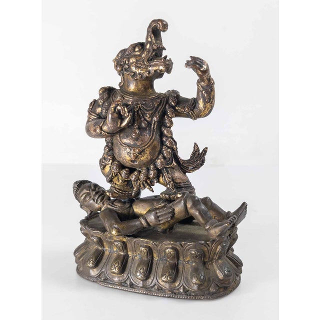 We are selling this beautiful Chinese Sino-Tibetan bronze figure. This unique gilt bronze or copper alloy figure features...