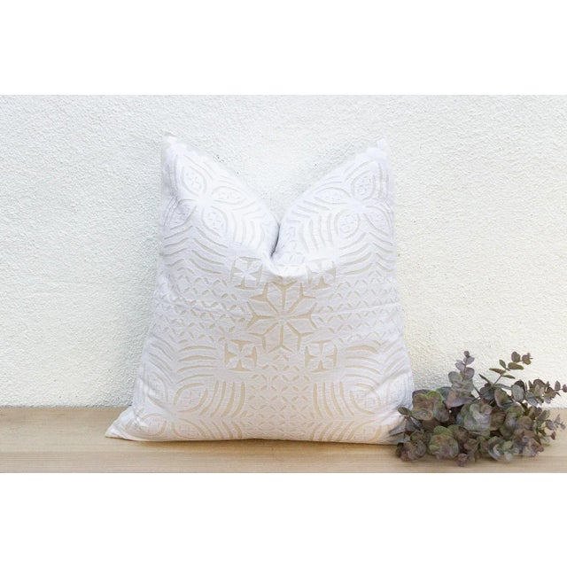 This decorative pillow cover features beautiful array of patterns, with hand crafted appliqué cut work, giving it a...