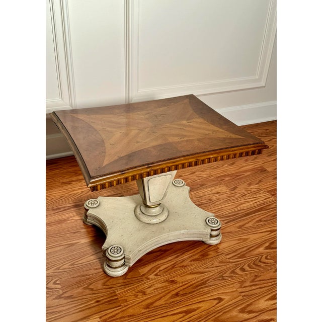 The mix of finishes on this Heritage brand French Provincial low side solid wood table make it an attractive piece. The...
