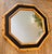 An elegant octagonal mirror designed by Vivai del Sud, crafted entirely from natural bamboo rods, with meticulous...