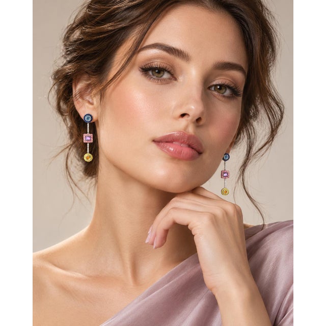 An eye-catching and modern pair of fine geometric drop dangle earrings crafted in solid 18k white gold. Designed with...