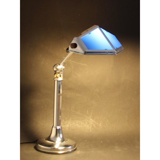 This desk lamp is made of chrome-plated metal and was designed in the city of Nice in the 1920s. This is the model with...