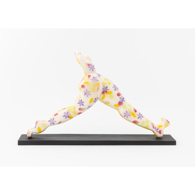 Francoise Abraham (French, b. 1962) Woman Walking Painted Resin Sculpture, mounted on black painted wood base. Overall:...