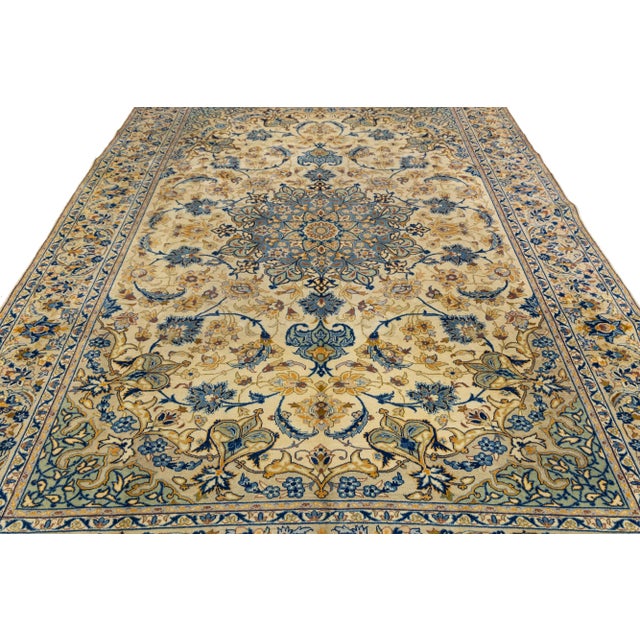 Transform your space with this Vintage Persian Kashan area rug, featuring a symmetrical central medallion and intricate...