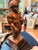 Inspired by the iconic sculptural style of Fernando Botero, this impressive after Botero bronze-patina sculpture depicts a...