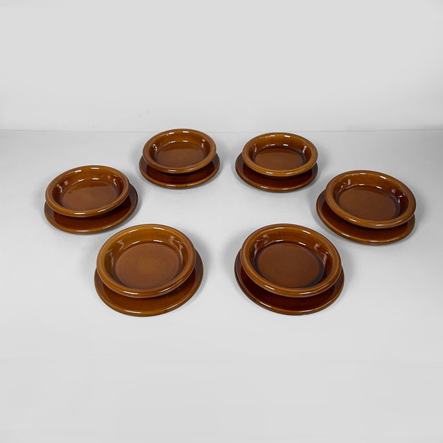 Italian mid-century modern brown ceramic tableware by Franco Bettonica for Gabbianelli, 1970s Brown ceramic dinnerware...