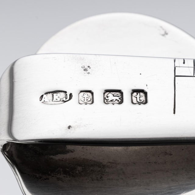 Antique 20th century english solid silver letter opener. This letter opener features some quirky additions, including a...