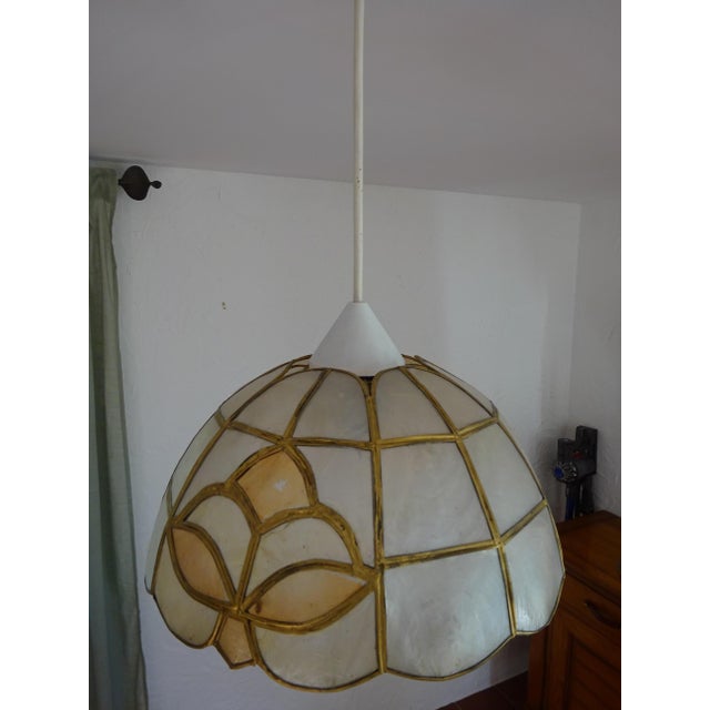 1970s model, white and pale pink, fleur-de-lis pattern. Mosaic with gold inserts. White PVC canopy, conical shape....