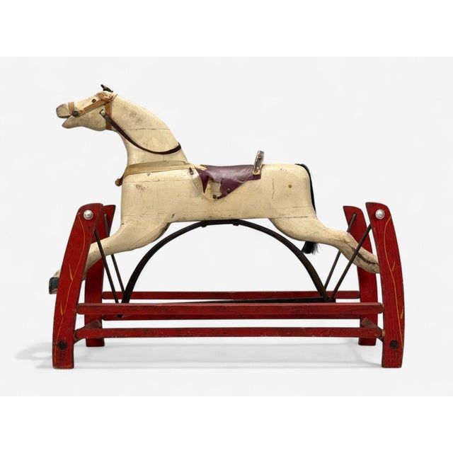 Victorian, Painted Wood, Primitive Rocking Horse, USA, 19th c. A charming Victorian-style rocking horse featuring a hand-...