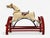 Victorian, Painted Wood, Primitive Rocking Horse, USA, 19th c. A charming Victorian-style rocking horse featuring a hand-...