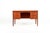 A beautiful and elegant Danish writing desk from the 1960s, crafted in warm teak with a stunning natural grain. This...