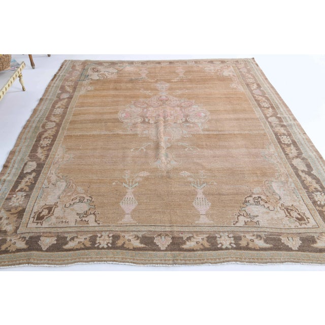 Vintage Turkish Hand-Knotted vintage rug is a semi-antique vintage area rug.'70s Eastern region of Turkey's unique rug is...