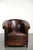 This charming vintage sheepskin club chair is modest in size and features beautiful, warm colors. This beloved club chair...