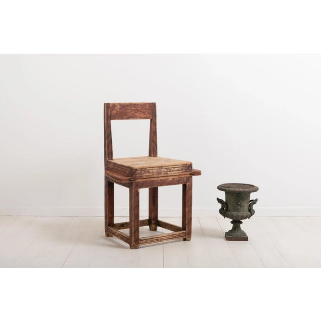 Primitive combined chair and table. This folk art combination furniture is a good example of 19th century compact living....