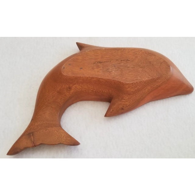 We love this extraordinary nut bowl for the fun dolphin shape that is so very realistic. There is a cursive inscribed...