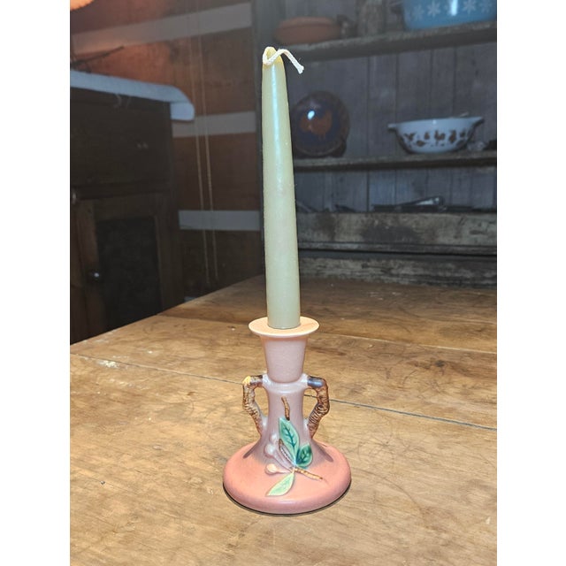 Simple, delicate candlestick crafted by Roseville in the Snowberry style.