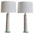 A tall Italian ceramic and glass table lamp, dating to the mid-20th century. The elongated ivory ceramic base is...