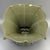 Classic Chinese celadon porcelain Gu‑shape archaic vase, featuring flared notched rim, segmented body and flared base. It...