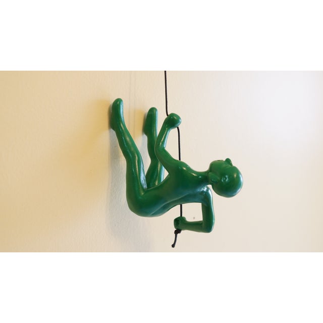 Our Vibrant Green Climbing Man is a beautiful addition to your wall decor! Curate your own collection with our variety of...