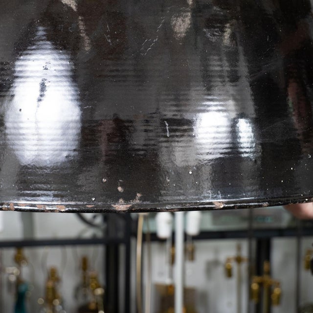 Industrial style, black enameled pendant light fixture.