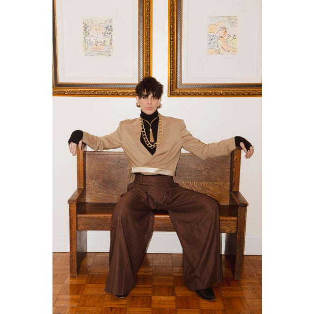 Antique oak pew or hall bench dating to circa 1910, associated with Gothic Revival design. Constructed from solid oak with...