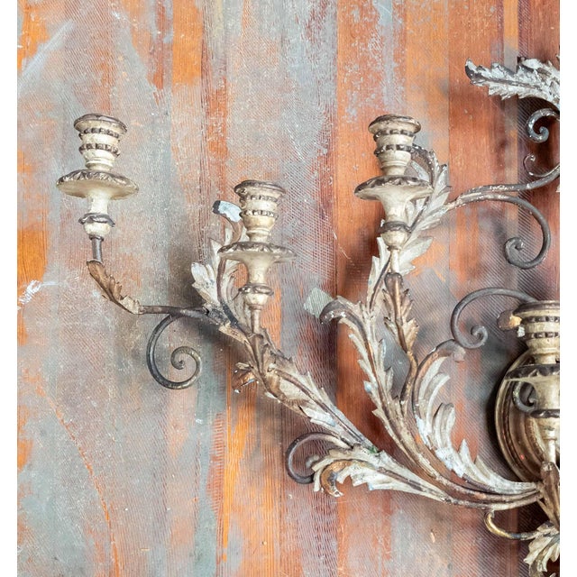 We are selling this very large Italian tole and wood wall sconces. This sconce has very large scale, it has eight carved...