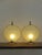 Set of two table lamps with brass and brushed metal structure and frosted glass diffusers, made in France in the 1950s...