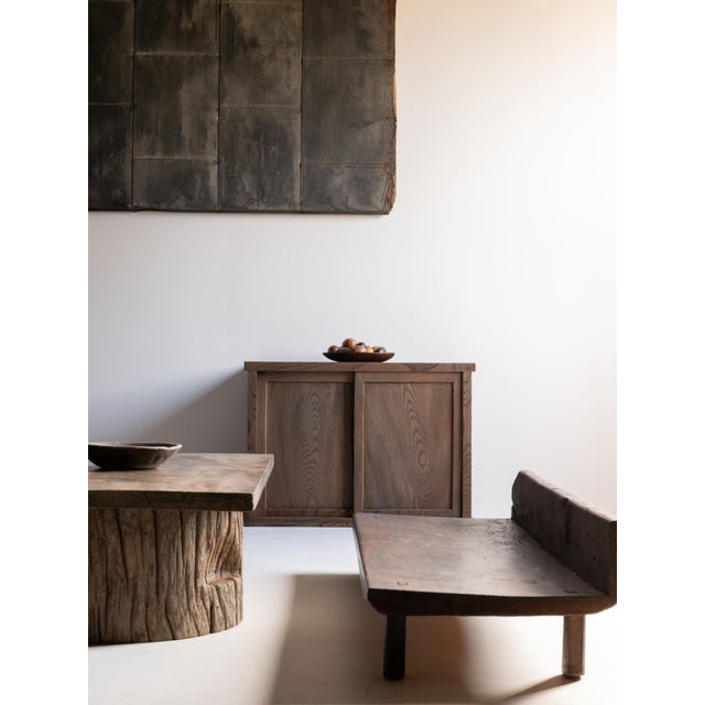 Antique Japanese tansu cabinet crafted in Japan during the Meiji period (late 19th to early 20th century). The sliding...