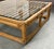 Authentic vintage Brown Jordan Rattan square cocktail table featuring a sculptural natural rattan frame, distinctive...