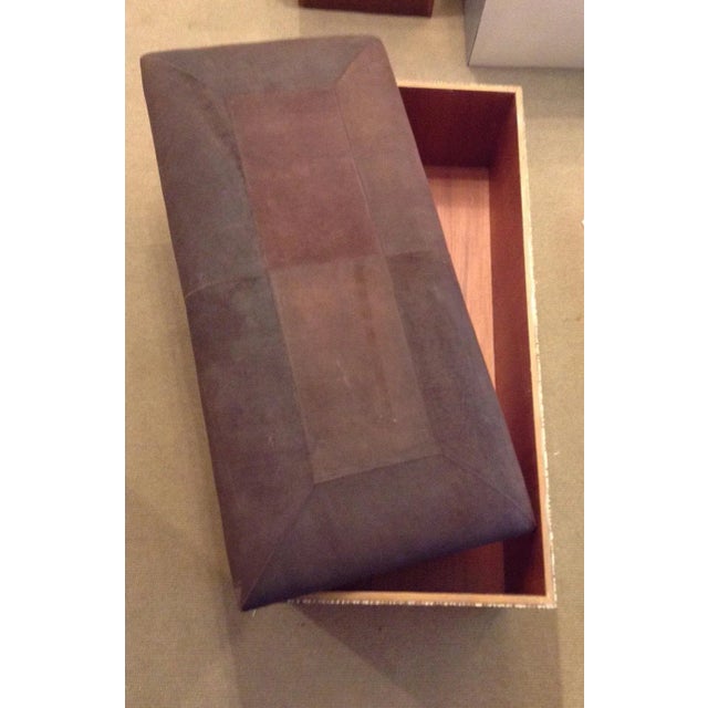 A unique padded seating and storage bench with upholstered leather lift-top. Top opens allows for ample storage space for...