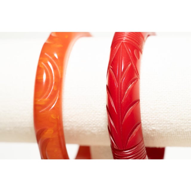 Vintage Carved Bakelite Bangle Bracelets in Red and Orange, 1930's, Pair Of For Sale - Image 11 of 17