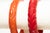 Vintage Carved Bakelite Bangle Bracelets in Red and Orange, 1930's, Pair Of For Sale - Image 11 of 17