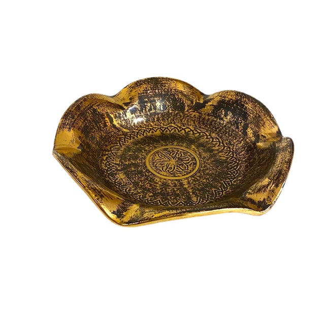 Beautiful Stangl Wavy edge shallow bowl. Hand glazed with a black wash over gold producing a very lovely, shiny effect. No...