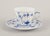 Royal copenhagen blue fluted plain. A set of four coffee cups with saucers in porcelain. Model number 1/80 dated:...