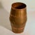 Hand hammered copper umbrella stand in the shape of a wine barrel, imitating wood is made in the 1950's. It holds several...