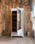 This elegant antique mirrored wardrobe captivates with its clean lines and luminous finish. With its large central mirror,...