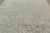 This 11x14 oversized antique Persian Tabriz rug, hand-knotted in wool and originating circa 1920-1940, is a graceful...