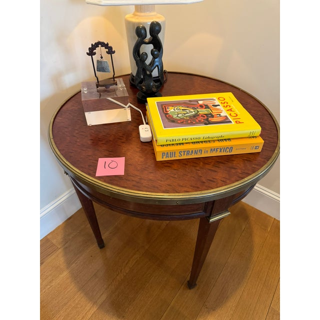 Exquisite table in Plum Pudding Mahogany c. late 19th century. We purchased it from an antique dealer in 2004. This piece...