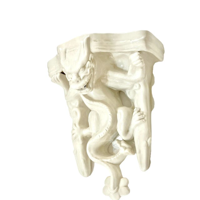 Fabulous vintage French ceramic wall sconce with gargoyle lizard creature. The gargoyle has fangs and sharp claws. There...