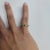 Contemporary S Style Emerald & Diamond Ring .15cttw 10k Yellow Gold, Size 8 For Sale - Image 3 of 5