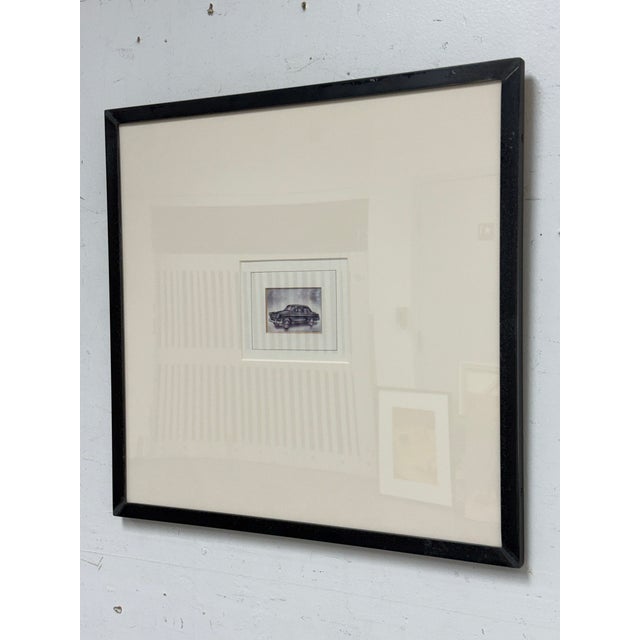 Design Plus Gallery presents an Etching of a Russian Automobile, likely the GAZ Volga. The artwork is compelling due to...