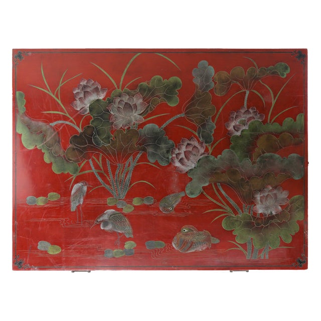 Vintage Chinese lacquer coffee table, painted with lotus flowers and koi fish in vivid green, red, and white. Designed...